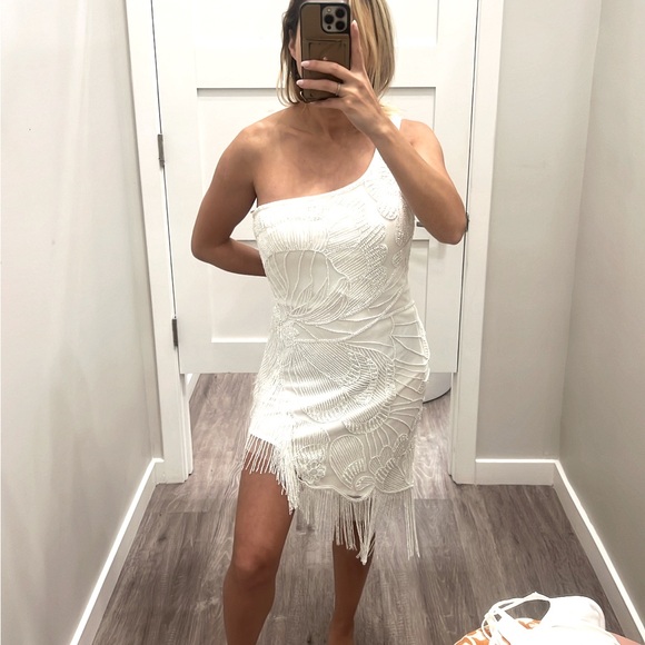White cocktail dress with gorgeous beading details and fun fringe